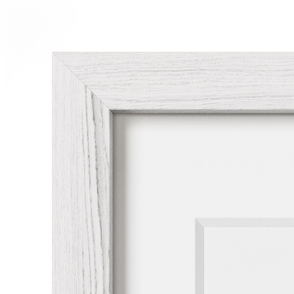 Corner of a white oak frame with a white mat